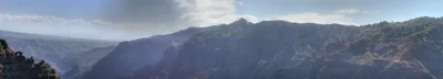 misty mountain range with layered ridges